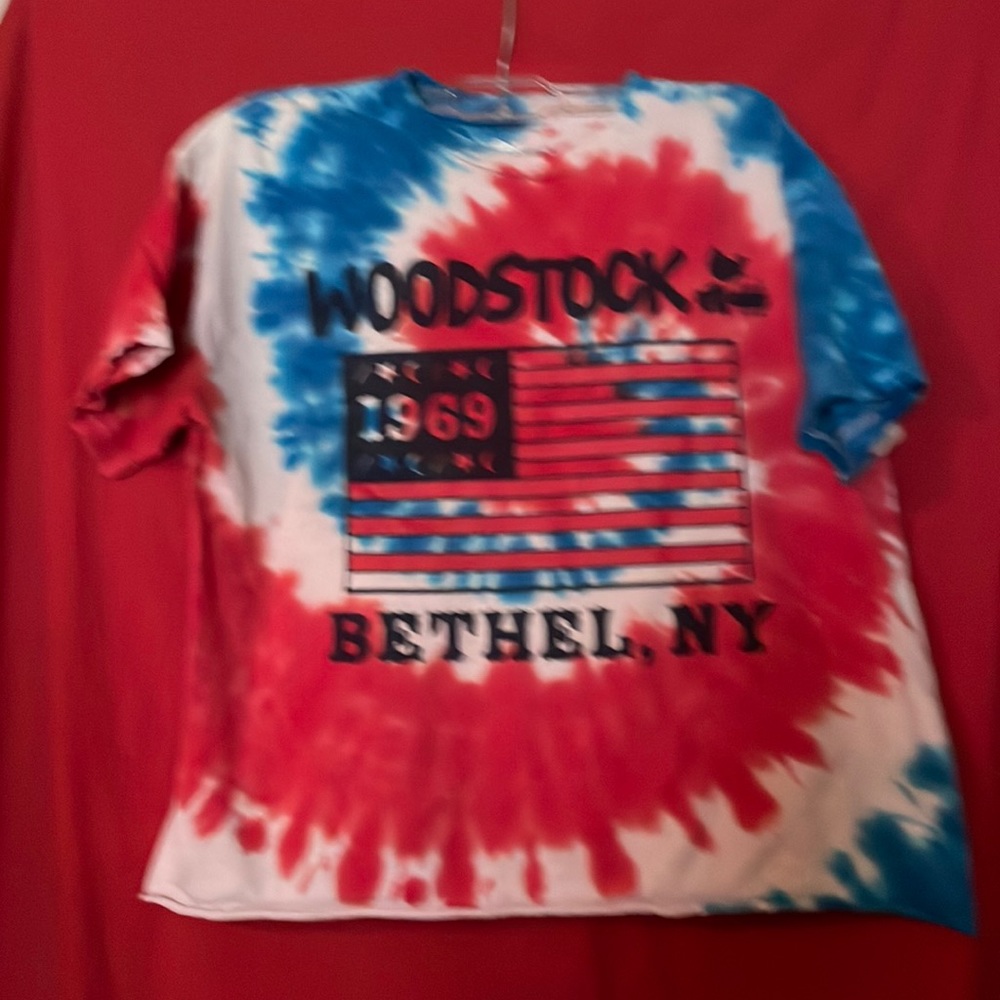 Woodstock cut off T- Shirt small.  Red, white and Blue tie dye.